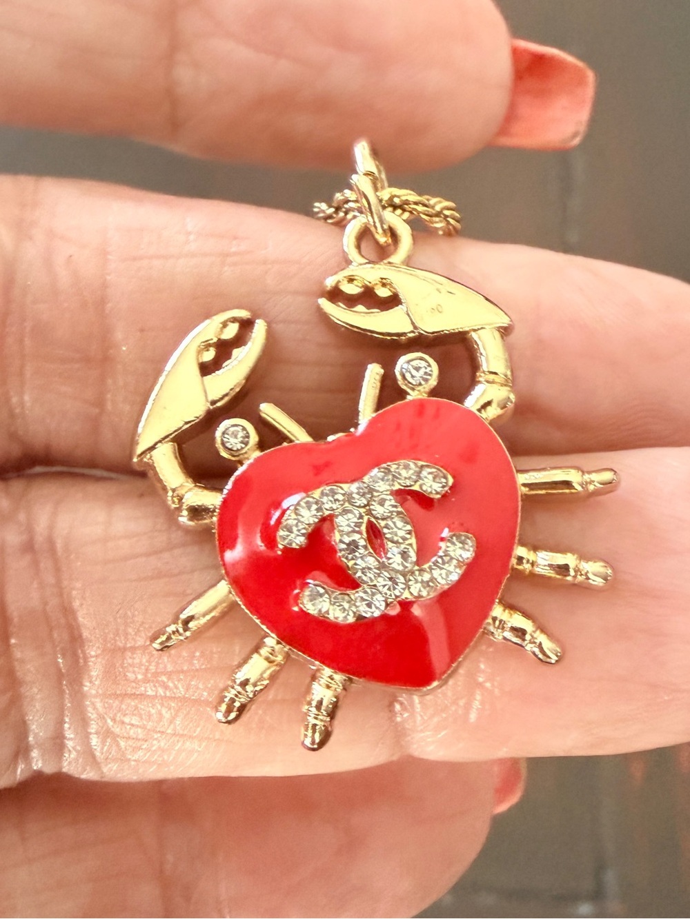 CHANEL Necklace with Red Heart CC
Crab on new 18kt gold plated twisted
Rope EUC